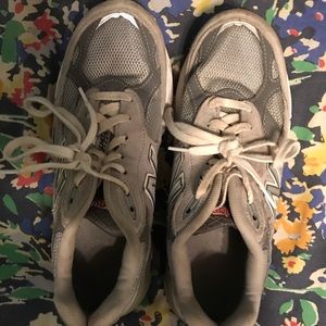 New Balance grey tennis shoes.